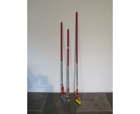 A set of three Wolf garden tools with interchangeable handles 