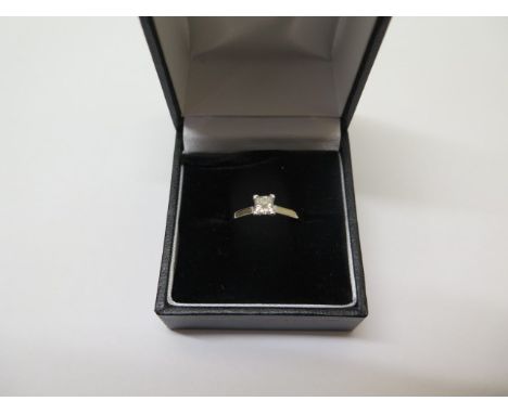 A platinum princess cut diamond ring, 0.35cts, VVS2,  colour G/H, size K, approx 3.6 grams, in good condition, comes with ins