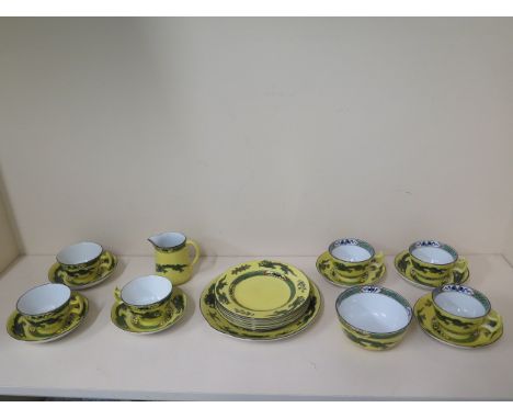 A Wilton ware chinoiserie six setting tea service with differing inner boarders - all good condition, some crazing 