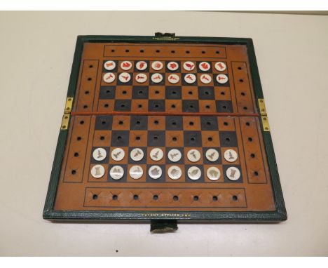 A good quality Edwardian leather bound travelling chess set by JC Vickery with bone button chess pieces, measures 23cm x 23cm