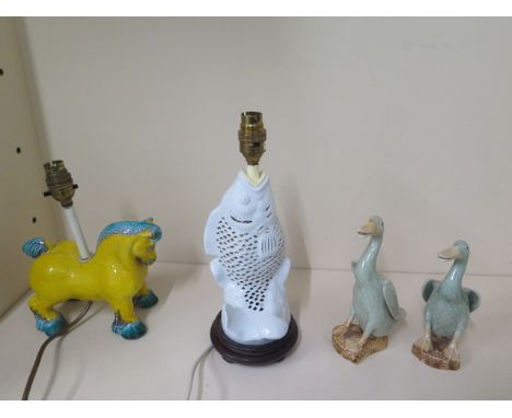 A pair of Oriental geese ornaments, a pierced fish lamp - height 31cm and a horse lamp - both working 