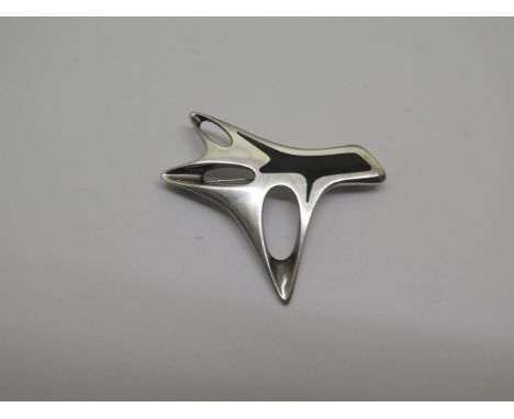 A Georg Jensen silver brooch by Henning Koppel with black enamel decoration HK number 323 - length 6cm  - in generally good c