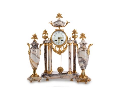 FRENCH MARBLE AND GILT BRASS CLOCK GARNITURE, LATE 18TH / EARLY 20TH CENTURY with two train movement striking on a bell, the 