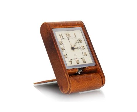 JAEGER LeCOULTRE, TRAVEL ALARM CLOCK, CIRCA 1950 eight day movement, the signed square dial set with Arabic numerals, in tan 