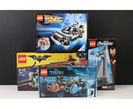 Lego - Four sealed TV related Lego sets featuring 40334 Marvel Studio 10 Year Avengers Tower, 21314 TRON: Legacy, 21103 Back 