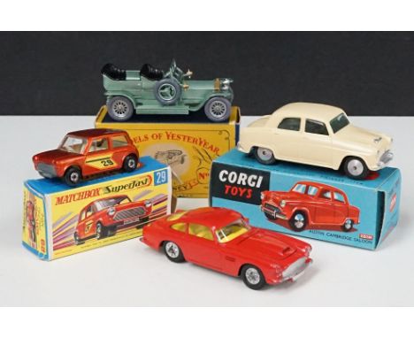 Three boxed diecast models to include Corgi 201M Austin Cambridge Saloon in cream, Matchbox Superfast Series No. 29 Racing Mi