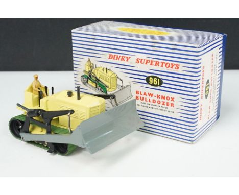 Boxed Dinky Supertoys 961 Blaw Knox Bulldozer in yellow with green tracks and driver figure, diecast ex overall with a couple