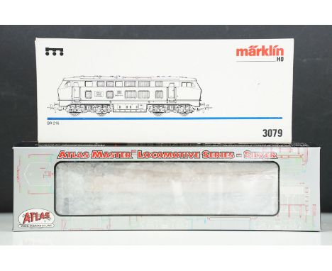 Two boxed HO gauge locomotives to include Marklin 3079 BR 216 and Atlas Silver Master Locomotive Series #7323 GE U30C Union P