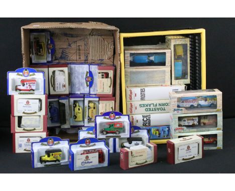 33 Boxed Oxford Diecast models to include Radio Times, Topper, PG Tips etc, with certificates, plus 13 x boxed / cased Lledo 