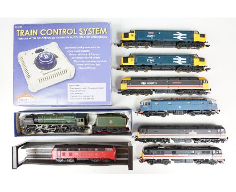 Eight OO / HO gauge locomotives to include Lima Norman Tunna GC, Bachmann E3058, Lima The Queens Own Mercian Yeomanry, Lima I