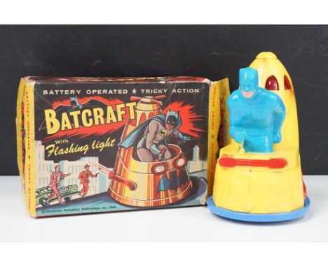 Boxed Marx Battery Operated Batcraft with flashing light, overall toy and boxed in gd condition with some marks and grubby in