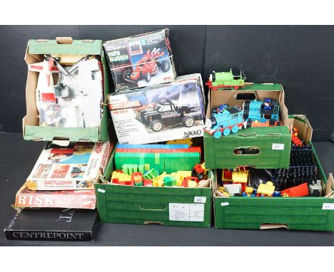 Large quantity of mixed toys and games to include boxed board games including Risk, boxed Nikko 1/18 Dirty Dawg R/C car, boxe