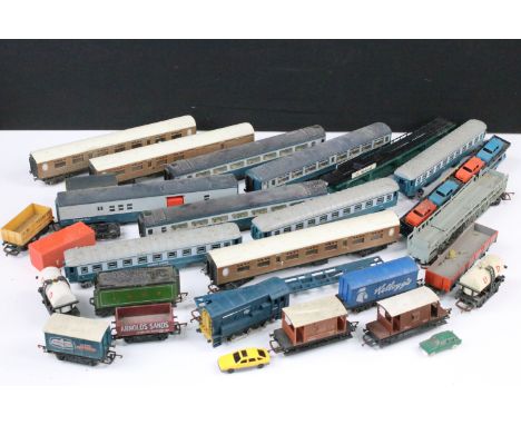 Around 25 OO gauge items of rolling stock to include coaches, wagons, car transporters etc featuring Hornby, Lima &amp; Jouef