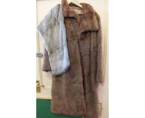A brown fur coat with a stitched label, Bakers of Kensington, plus a grey stole