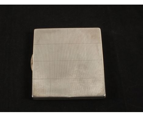 A Silver engine turned cigarette case by A.Wilcox, Birmingham 1934