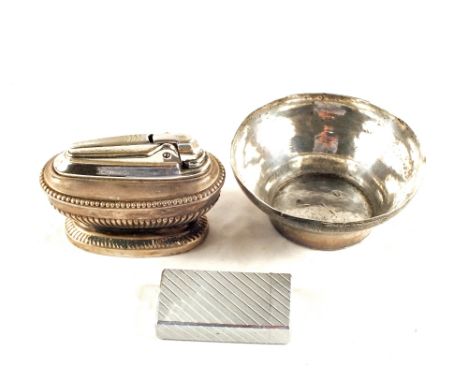 An Indian Silver metal bowl with calligraphy and two cigarette lighters