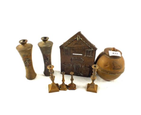 A Victorian Brass cottage money bank, Liptons Wembley tea caddy and other items
