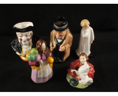 A Goss balloon seller, Royal Doulton HN1985 Darling, HN2167 Home Again, Winston Churchill character jug and one other