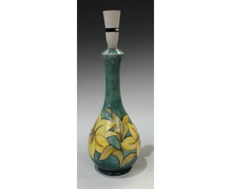 A Moorcroft slender Lily pattern ovoid lamp base, 35cm high, Late Queen Mary paper label to base 