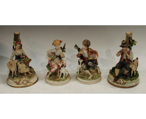 Ceramics - a pair of capodimonte figural candlestick, Picolo shepherd and shepherdess, impressed signature possibly Rouchi, 2