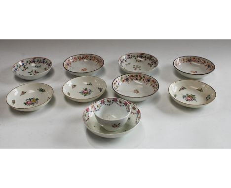 A Newhall tea bowl and saucer, decorated in famille rose, with stylised flower sprigs, c.1800;  other saucers;  etc 