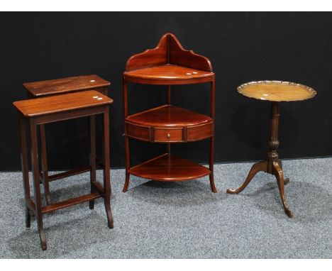 A mid 20th century mahogany washstand; mahogany wine/tripod table; a pair of mahogany lamp tables.(4) 