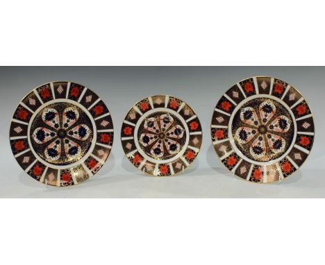 A pair of Royal Crown Derby Imari palette 1128 pattern dinner plates, printed marks, first quality, 27cm diameter; an 1128 pa