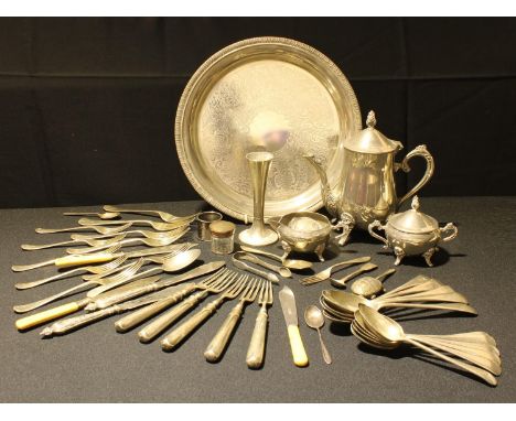 A silver topped dressing table jar, London 1908, 4cm diameter; a silver christening fork and spoon, Birmingham 1930; a pair o