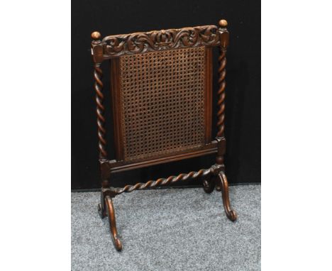 A mid 20th century oak fire screen, 86.5cm high. 