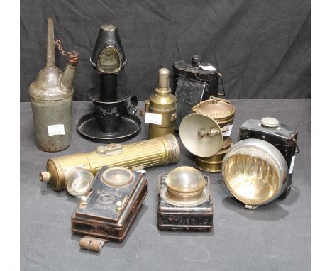 Aladdinette black tin paraffin chamberstick type lamp; a British Miller lamp; a Daimon Telko trio lamp etc (9) 