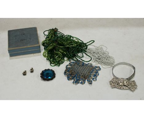 A metamorphic buckle/brooch/clips, set with stones; similar bangle and earrings; a blue glass stone brooch; bead necklace; et