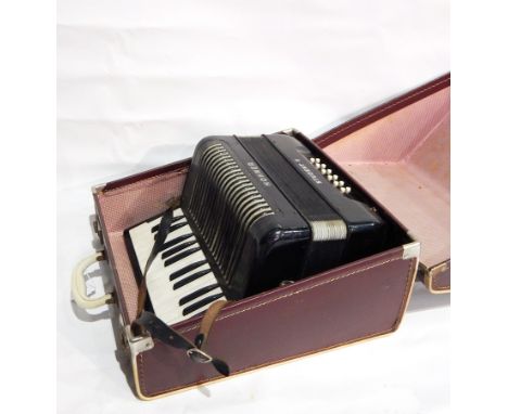 A piano accordion, three framed pictures, cigarette cards of trains, RAF planes 