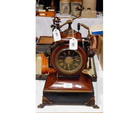 A 19th century Empire style red and black marble cased mantel clock with ormolu mounts, black dial, by J T Barry, Cardiff, he