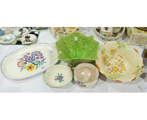 Three items of Poole pottery, floral decorated with dash borders, Shorter & Son green leaf mould pottery salad bowl and anoth