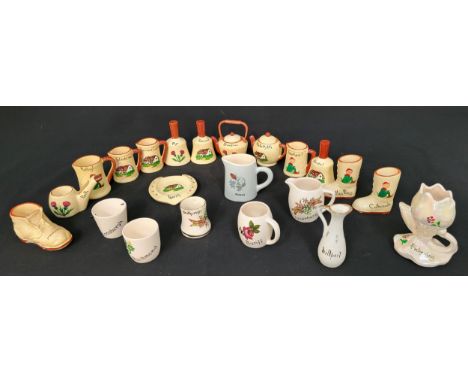 SELECTION OF MANOR WARE, NORTH DEVON POTTERY AND OTHER SOUVENIR CERAMIC ITEMSincluding boots, bells, a kettle, a pipe and var