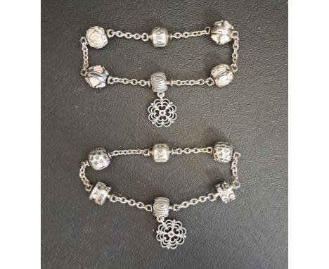 TWO PANDORA SILVER FIVE CLIP STATION BRACELETSeach complete with five clips, two with dangle charms and some with enamel deta