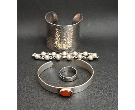 LARGE HAMMERED SILVER CUFF BANGLEtogether with a cabochon carnelian set silver bangle; and a silver ball link bracelet (3) 