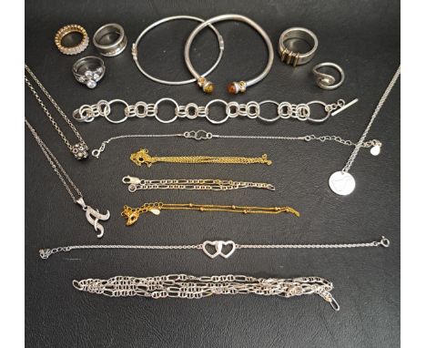 SELECTION OF SILVER JWELLERYincluding five rings, a bangle with amber set finials, a multi ring link bracelet, pendants on ch