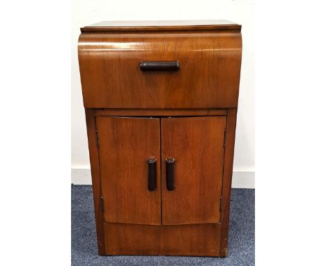 PLUS-A-GRAM RECORD PLAYERin mahogany veneered cabinet, the fall flap revealing record player above double cupboard doors with