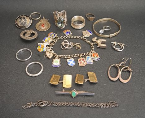 SELECTION OF SILVER JEWELLERYincluding an enamel decorated silver souvenir charm bracelet, a pair of gold on silver cufflinks