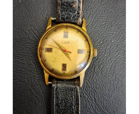 VINTAGE LUCH RUSSIAN WRISTWATCHthe circular dial with markers at 3, 6, 9 and 12, on leather strap 