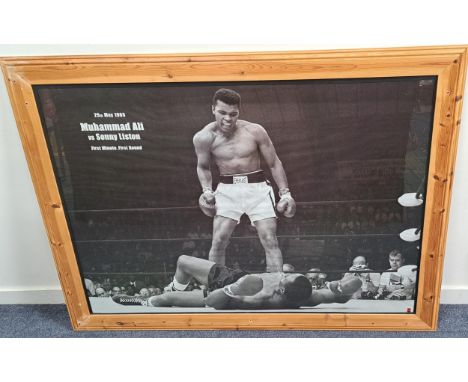 LARGE FRAMED POSTER OF MUHAMMAD ALITitled '25th may 1965 Muhammad Ali vs Sonny Liston First minute, first round', framed and 