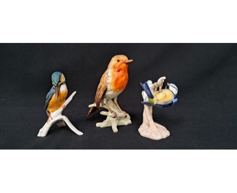 THREE GOEBEL BIRD ORNAMENTScomprising a blue Titmouse, a Robin and a Common Kingfisher, the largest 11cm high 