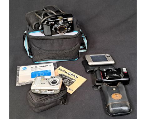 SELECTION OF VINTAGE CAMERASincluding Minolta AF-DL in case, Konica F3.5 in case, Kodak easy share CX7330 and HP travel compa