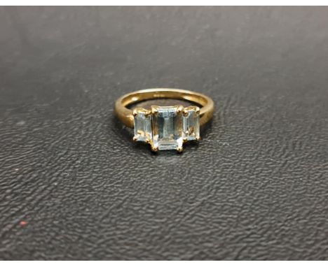 GRADUATED AQUAMARINE THREE STONE RINGthe rectangular step cut gemstones, totalling approximately 0.1cts, on nine carat gold s