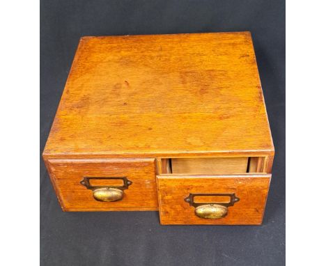 VINTAGE OAK INDEX CARD FILING CABINETwith two drawers and brass handles and tag holders, 39 x 16 x 40cm 
