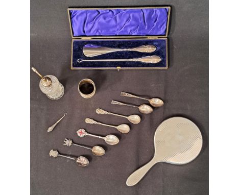 SELECTION OF SILVER ITEMScomprising a pair of George V napkin rings, Chester 1913; four souvenir spoons; an RNLI enamel decor