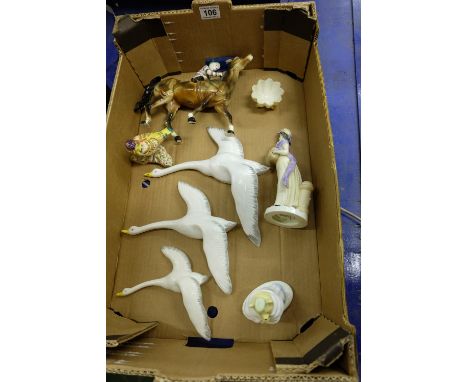 A collection of pottery to include Coalport Paddington Bear figure, set 3 Seagull wall plaques, Fake Beswick Horse and Jockey