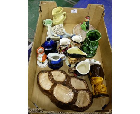 A collection of pottery to include character jugs, Beswick tree trunk display stand, Doulton Dickens figure on base, etc