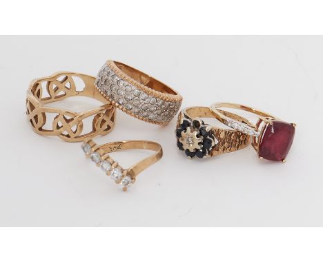 Five 9ct yellow gold rings including a Celtic design band, cz set rings, etc, total weight 19.20gm.
